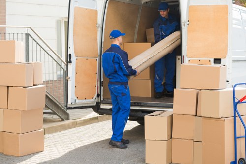 Person using an accessible moving service website on a laptop